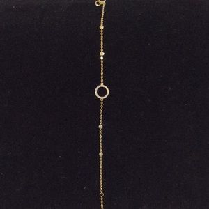 Women’s gold and CZ bracelet
